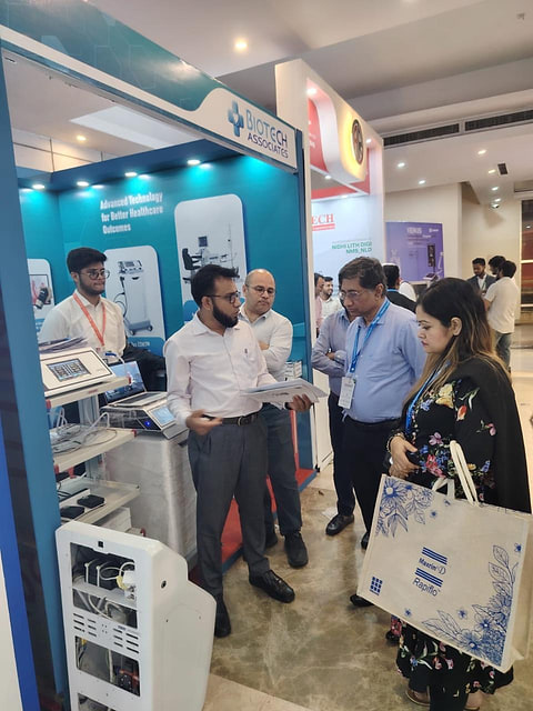 Equipment demonstration in progress at the exhibition stand